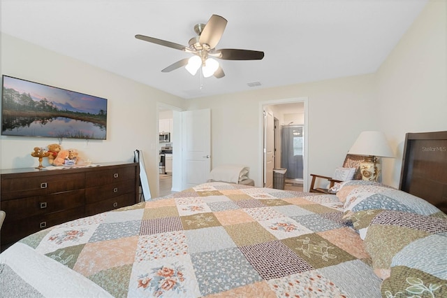 bedroom with visible vents, ceiling fan, and ensuite bathroom