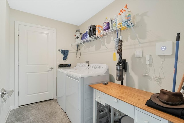 clothes washing area featuring laundry area and independent washer and dryer