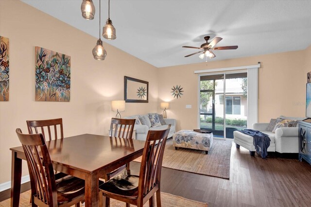 dining area with a ceiling fan and wood finished floors