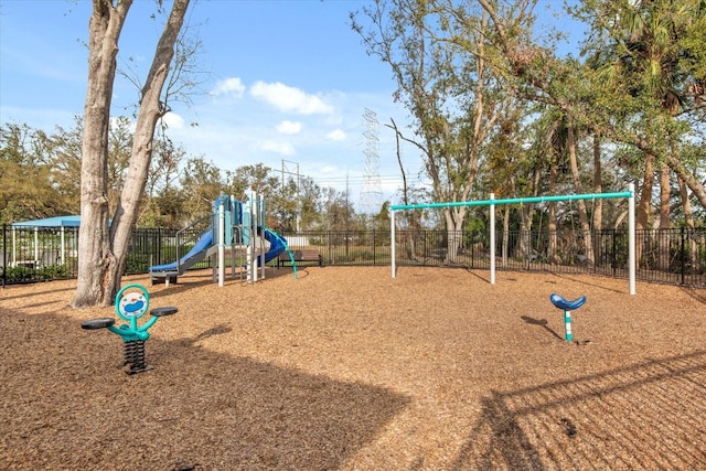 community jungle gym with fence