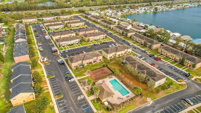 aerial view featuring a water view and a residential view