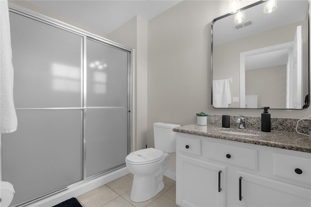 full bathroom featuring tile patterned flooring, visible vents, a shower stall, and toilet