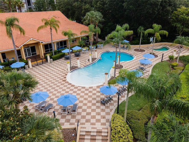 community pool featuring a patio