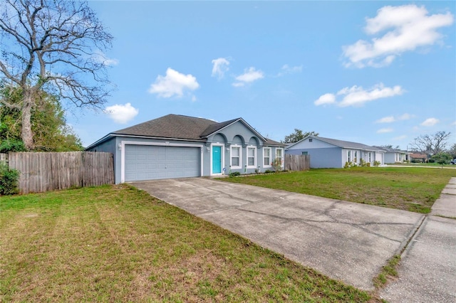 single story home featuring stucco siding, fence, a garage, driveway, and a front lawn