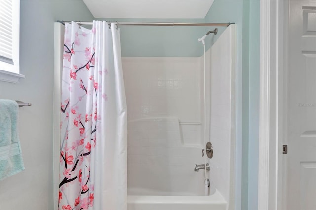 full bath featuring shower / bath combination with curtain