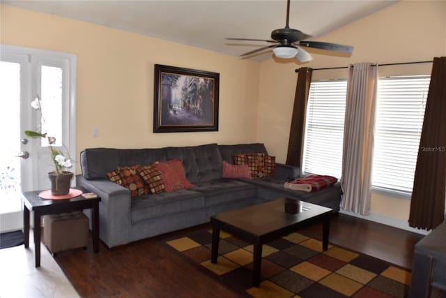 living area with a healthy amount of sunlight, wood finished floors, and a ceiling fan