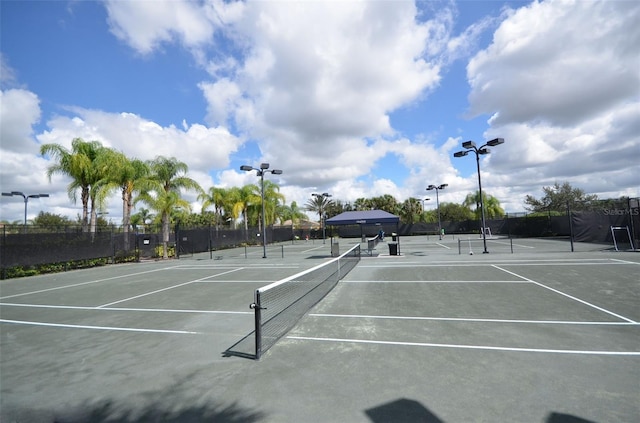 view of sport court with fence