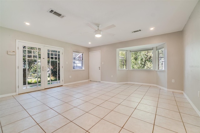 spare room featuring ceiling fan, visible vents, and recessed lighting