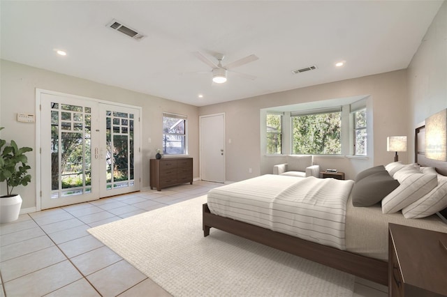 bedroom with light tile patterned floors, recessed lighting, visible vents, and access to exterior