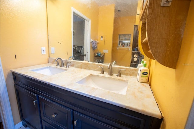 bathroom with double vanity and a sink