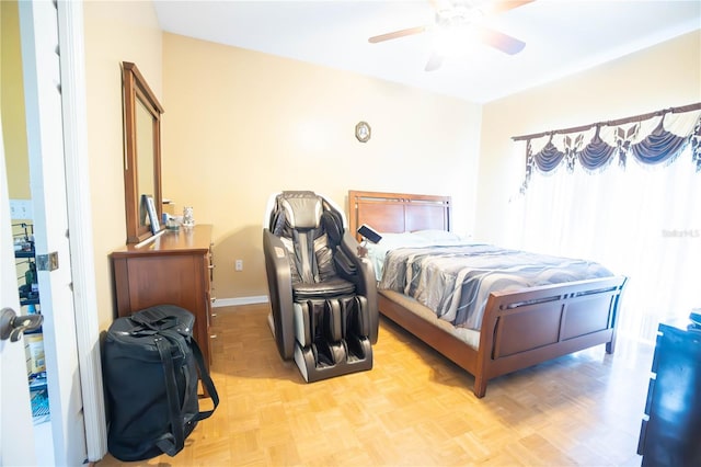 bedroom featuring baseboards and a ceiling fan