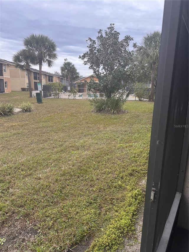 view of yard featuring fence