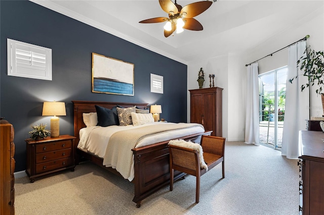 bedroom featuring baseboards, ceiling fan, access to exterior, a raised ceiling, and light colored carpet