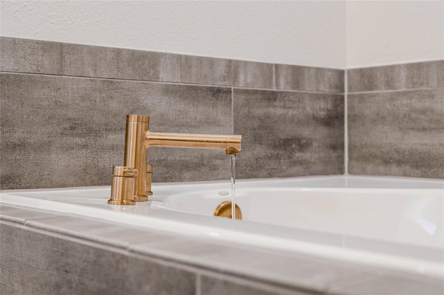 room details featuring a sink and a bathtub