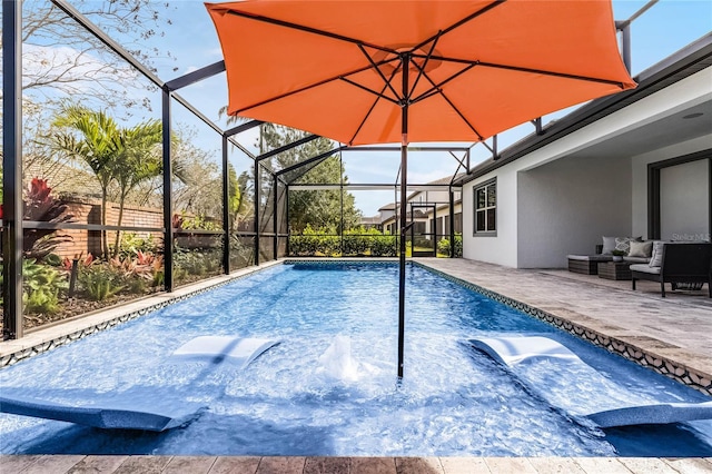 pool with glass enclosure, a patio, and an outdoor living space