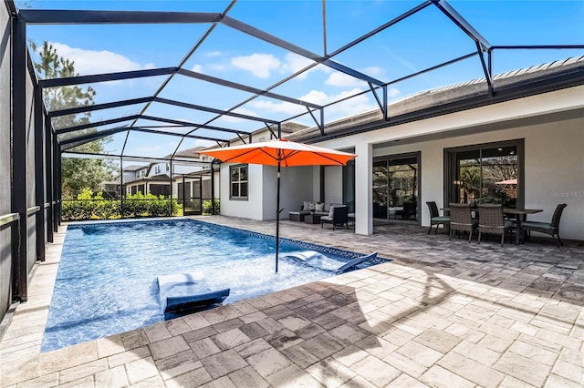 outdoor pool featuring glass enclosure, an outdoor hangout area, outdoor dining area, and a patio