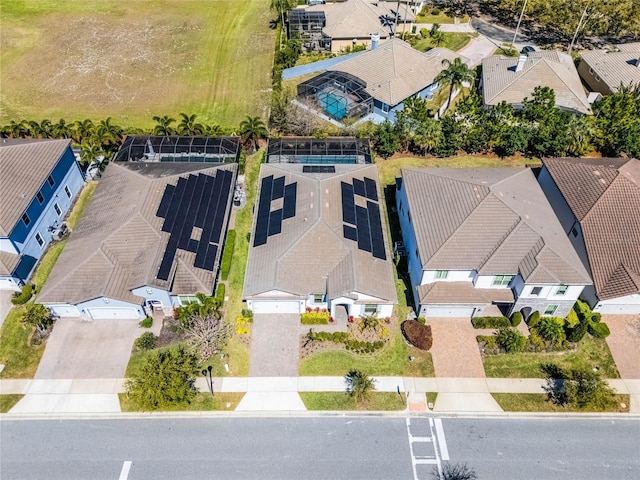 birds eye view of property with a residential view