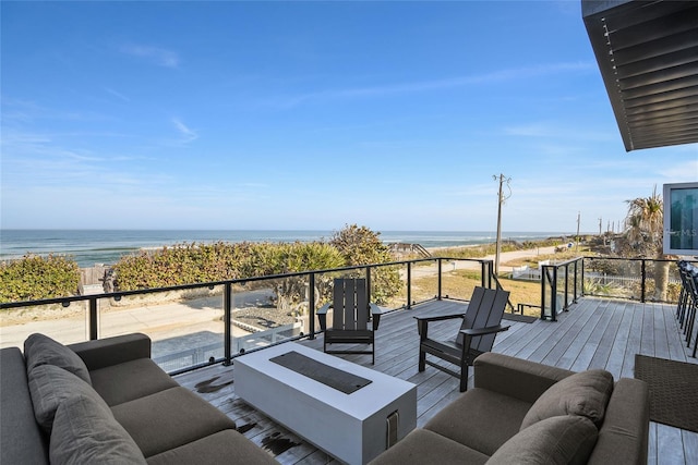 wooden deck featuring an outdoor hangout area and a water view