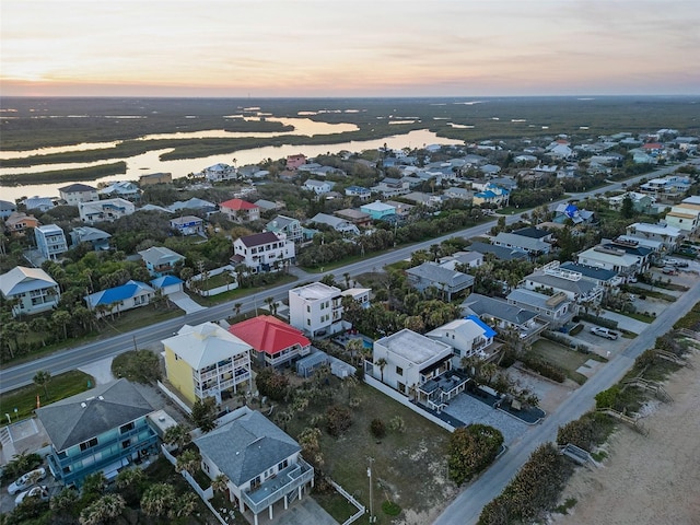 aerial view at dusk with a residential view