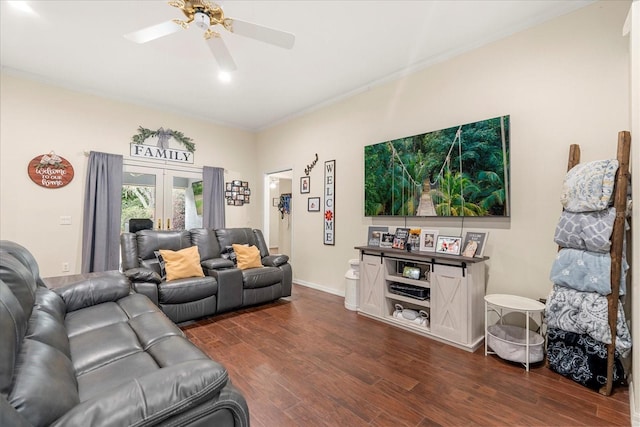 living area with ceiling fan, french doors, ornamental molding, and dark wood-style flooring