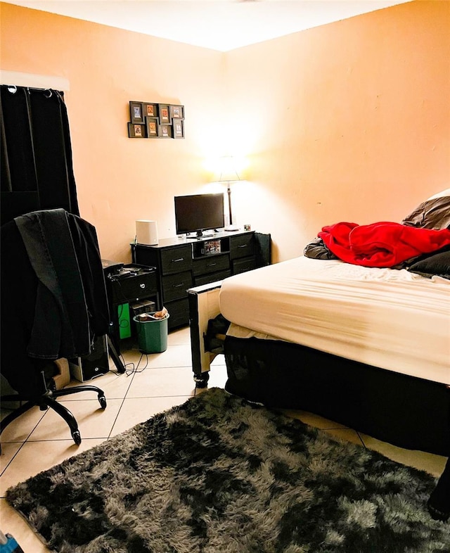 bedroom featuring light tile patterned floors