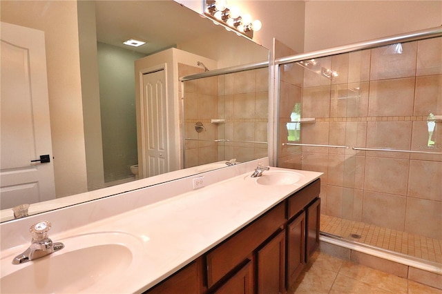 1862 Great Falls Way, Orlando, FL 32824 - full bath featuring a shower stall, double vanity, and tile patterned flooring