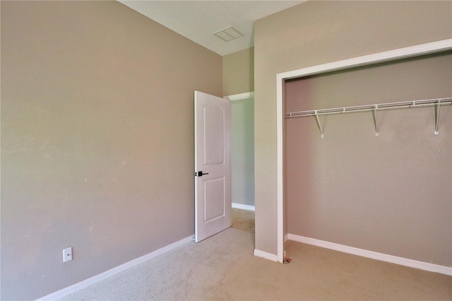 1862 Great Falls Way, Orlando, FL 32824 - unfurnished bedroom with light colored carpet and a closet