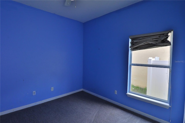 1862 Great Falls Way, Orlando, FL 32824 - spare room with baseboards and carpet flooring