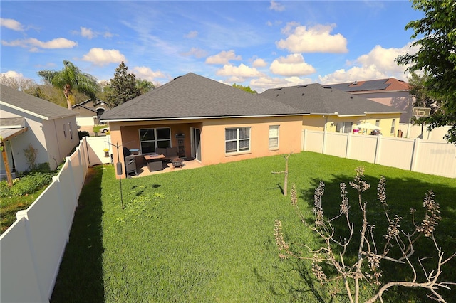 1862 Great Falls Way, Orlando, FL 32824 - rear view of house with an outdoor hangout area, stucco siding, and a fenced backyard