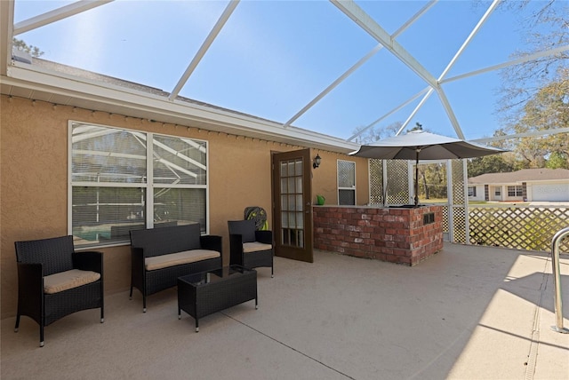 view of patio featuring a lanai and an outdoor hangout area