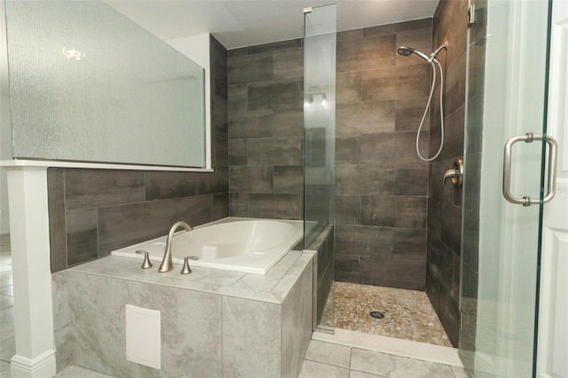 full bathroom with a garden tub and a shower stall