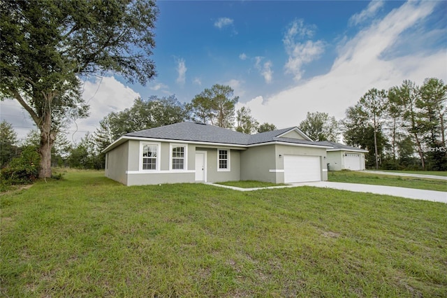 single story home featuring an attached garage, a front lawn, concrete driveway, and stucco siding