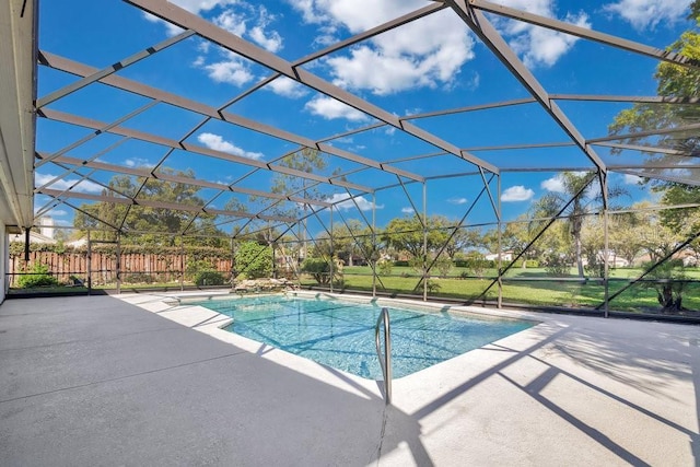 outdoor pool featuring a lanai and a patio