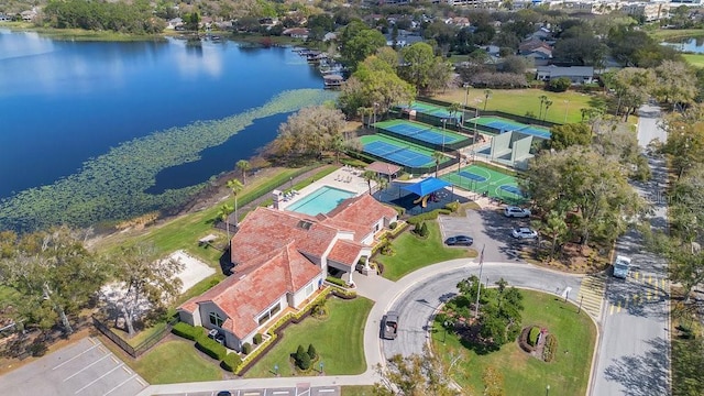 birds eye view of property with a water view