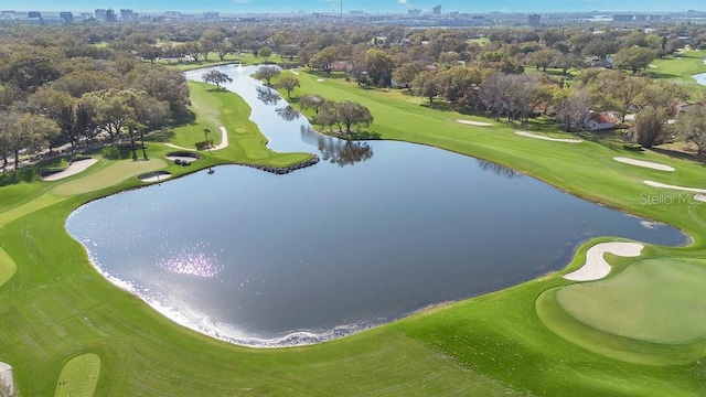 aerial view featuring view of golf course and a water view