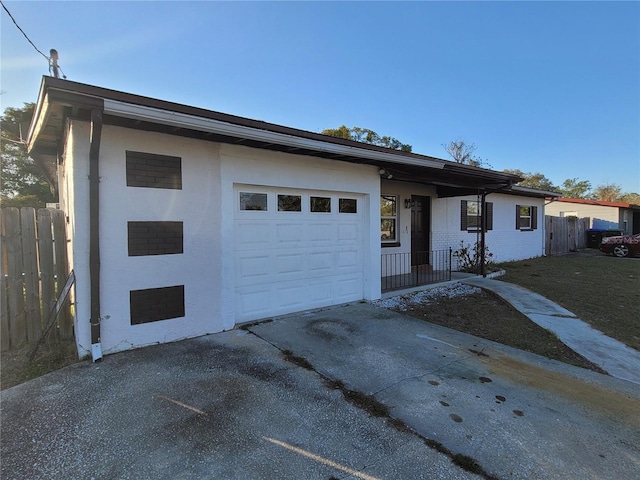 1616 Ferndell Rd, Orlando, FL 32808 - single story home with driveway, fence, and a garage