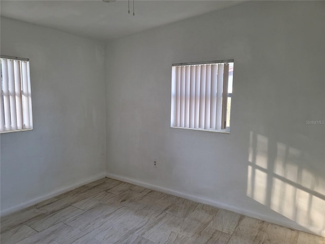 1616 Ferndell Rd, Orlando, FL 32808 - empty room with baseboards and wood finished floors