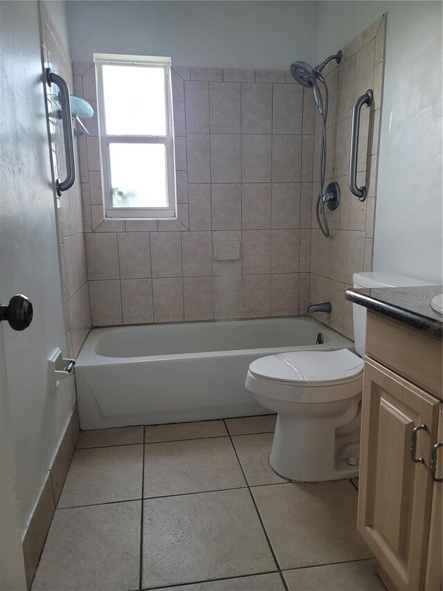 1616 Ferndell Rd, Orlando, FL 32808 - bathroom featuring toilet, tile patterned floors, tub / shower combination, and vanity