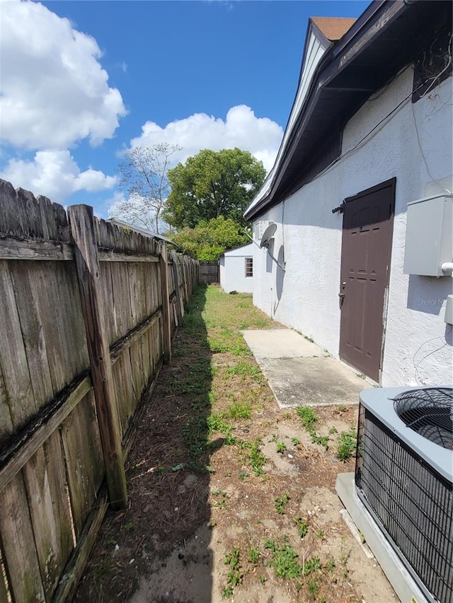 1616 Ferndell Rd, Orlando, FL 32808 - view of yard with cooling unit and fence