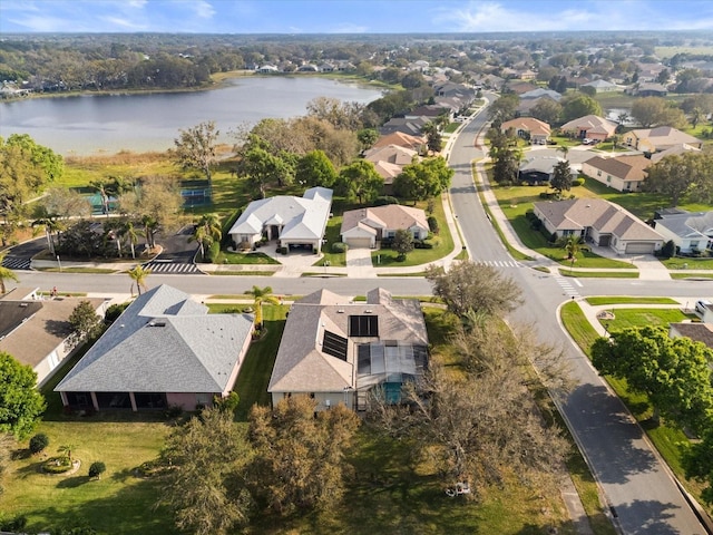 aerial view featuring a water view and a residential view