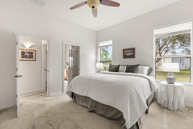 bedroom featuring a ceiling fan, carpet flooring, visible vents, and baseboards