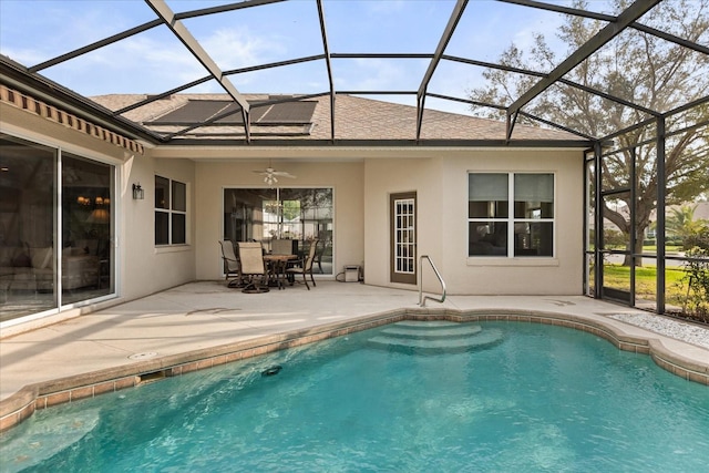 pool featuring ceiling fan, a patio area, and a lanai