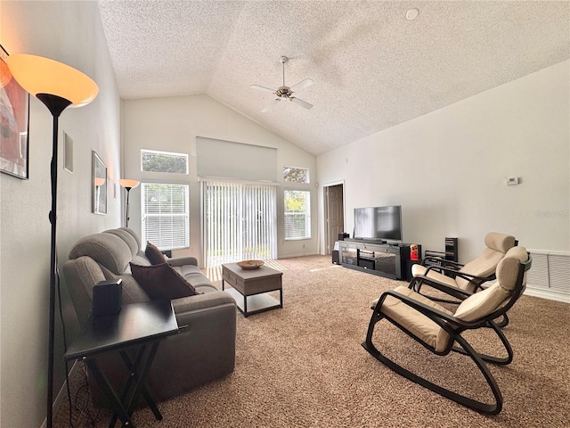 living room with visible vents, ceiling fan, a textured ceiling, carpet flooring, and high vaulted ceiling