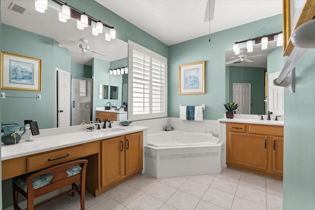 bathroom featuring visible vents, a sink, a garden tub, and ceiling fan