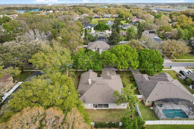 birds eye view of property with a residential view