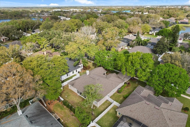 bird's eye view featuring a residential view and a water view