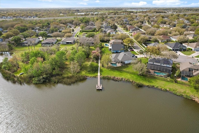 birds eye view of property featuring a residential view and a water view