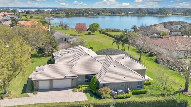 birds eye view of property featuring a water view