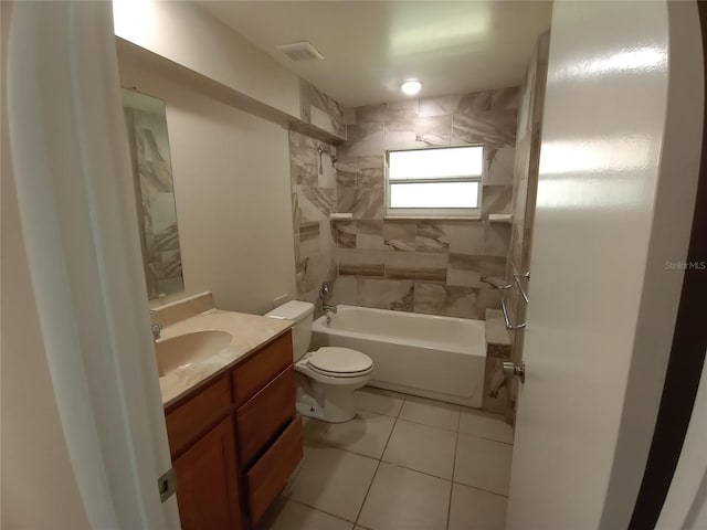 full bathroom featuring tile patterned flooring, toilet, visible vents, vanity, and shower / washtub combination