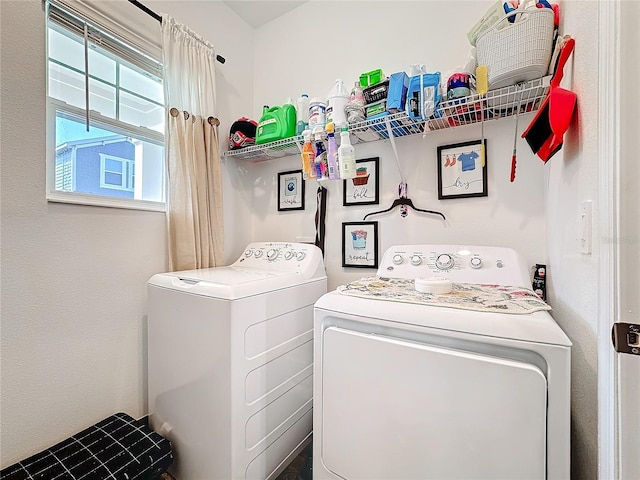 clothes washing area featuring laundry area and independent washer and dryer